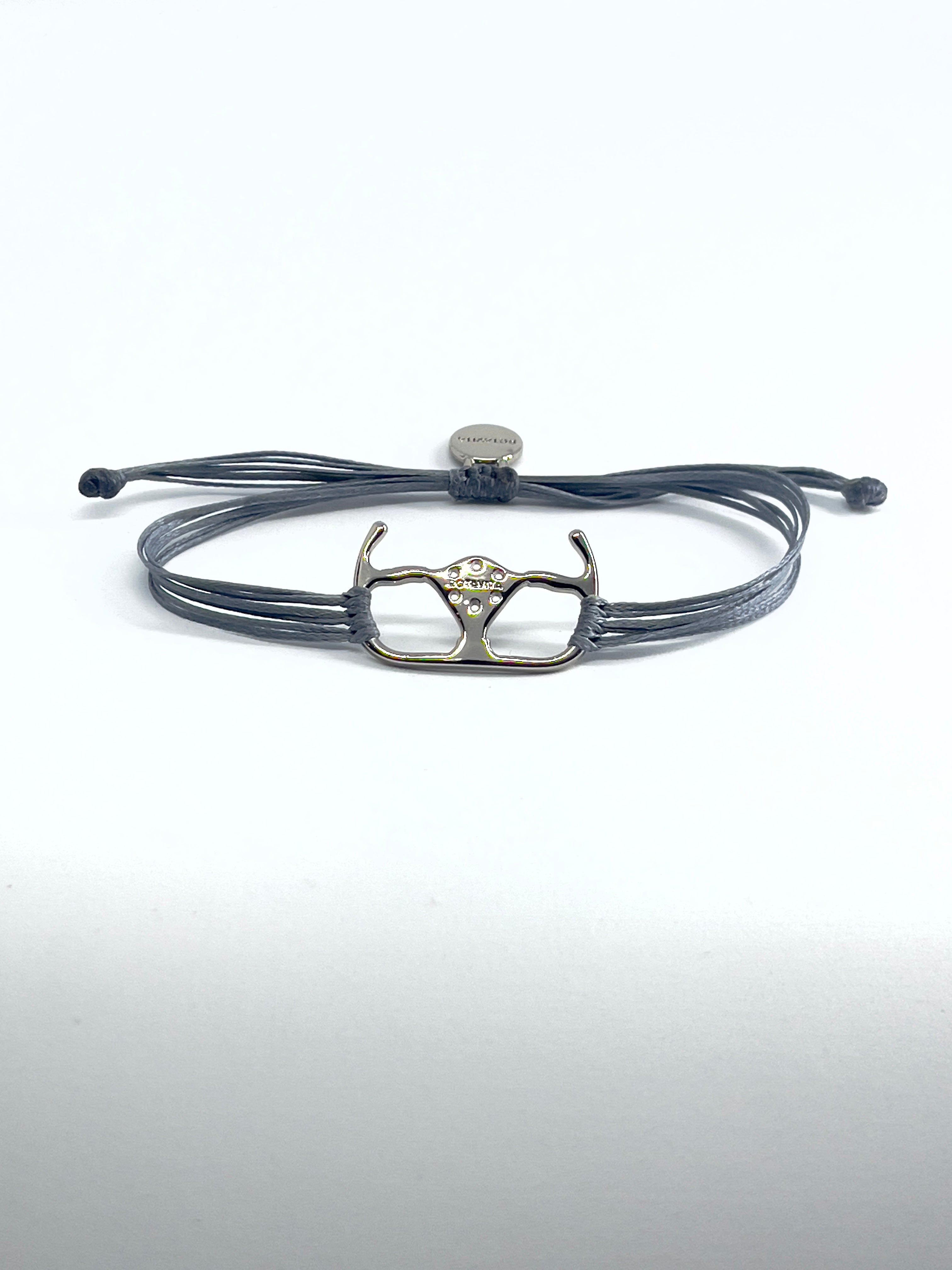 Racing steering wheel bracelet