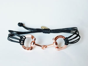 Rose gold horse bit snaffle bracelet in leather string